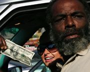 Paris Hilton giving 100$ to a homeless man